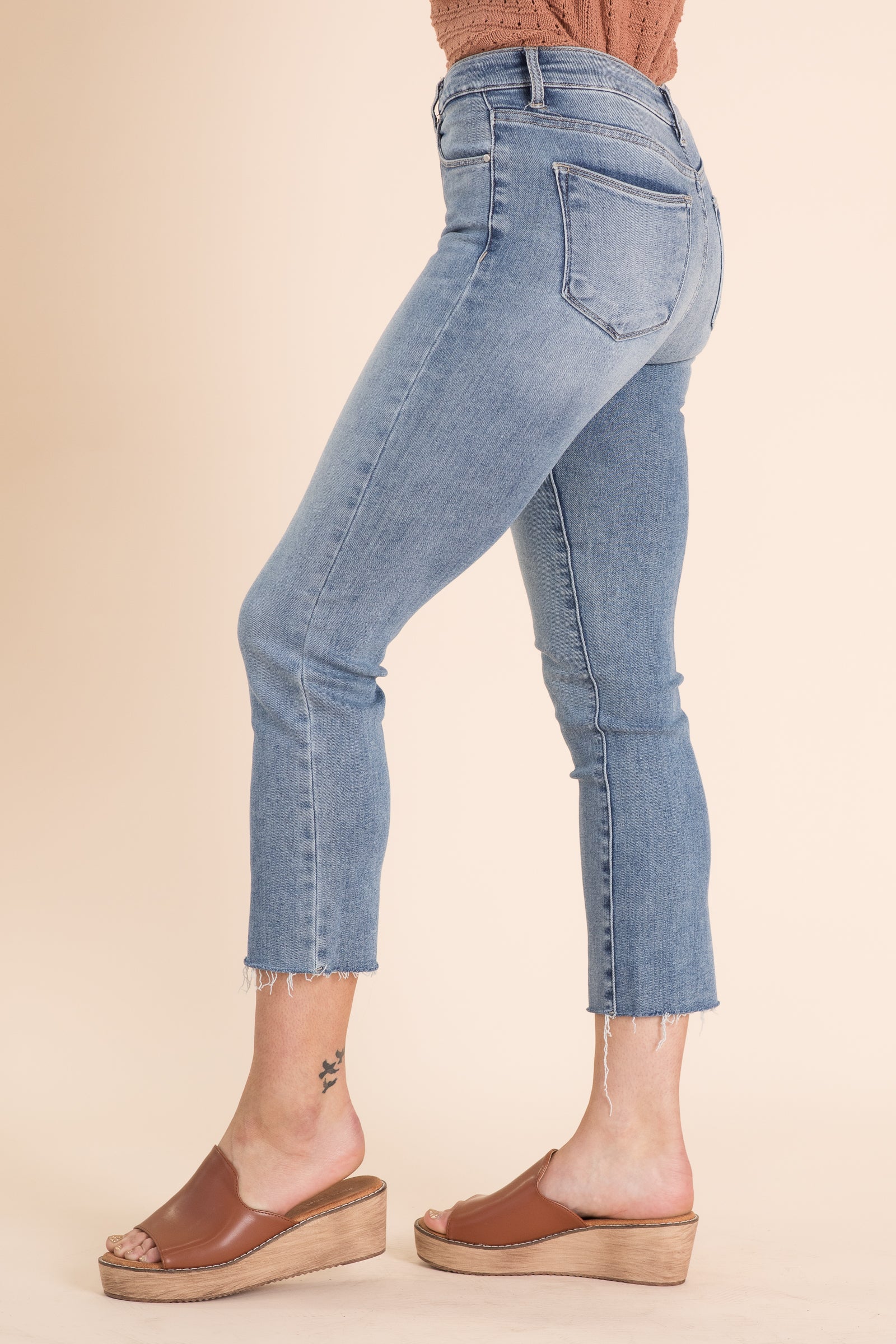 Risen Mid Rise Raw Hem Straight Leg Jeans