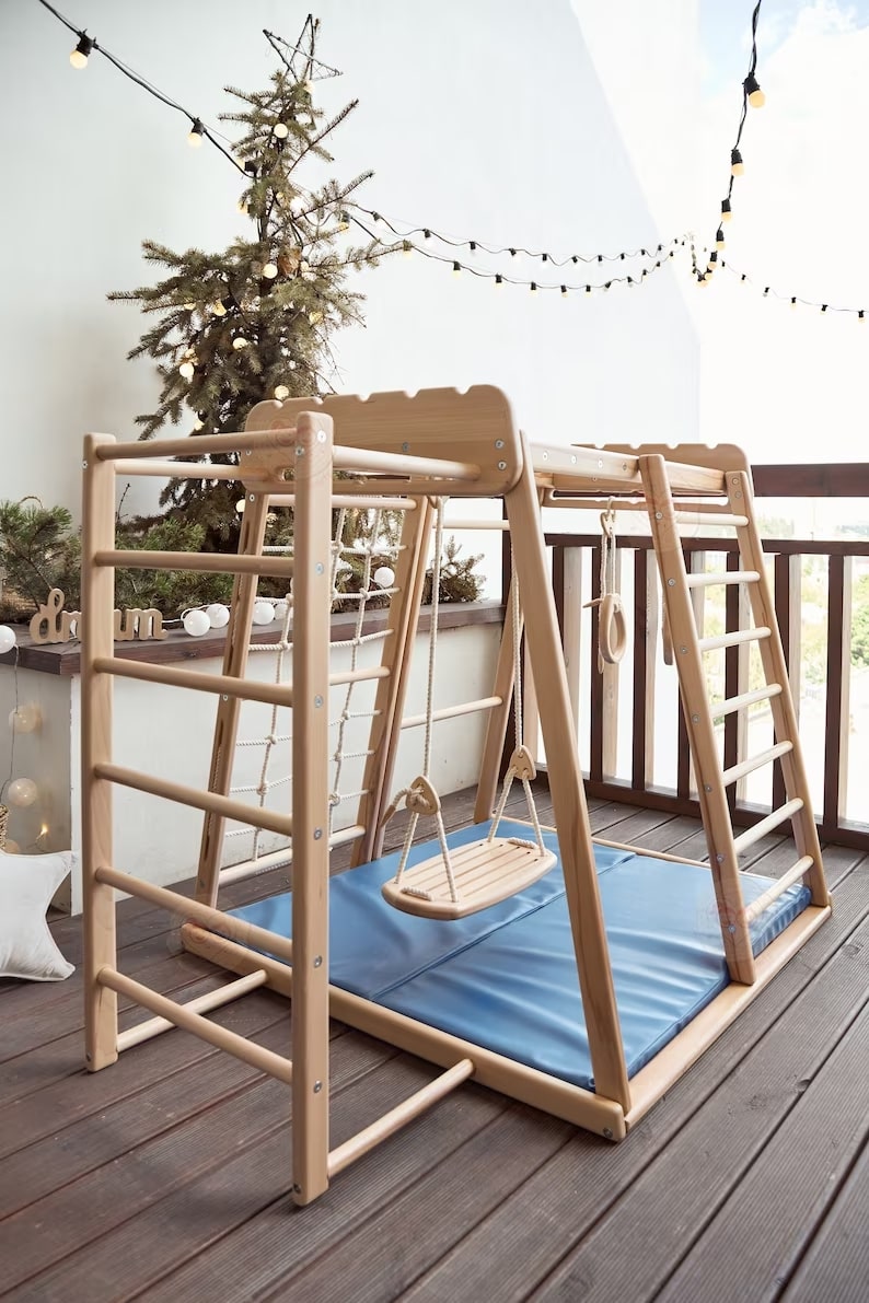 Woodandhearts Scandinavian Play Complex: Swedish Stepladder， Rocking Ramp， Climbing Rope， Monkey Bars， Gymnastic rings， Kid Swing， Play Mat， Jungle Gym， Wooden Natural color， for Kids 1-4 years