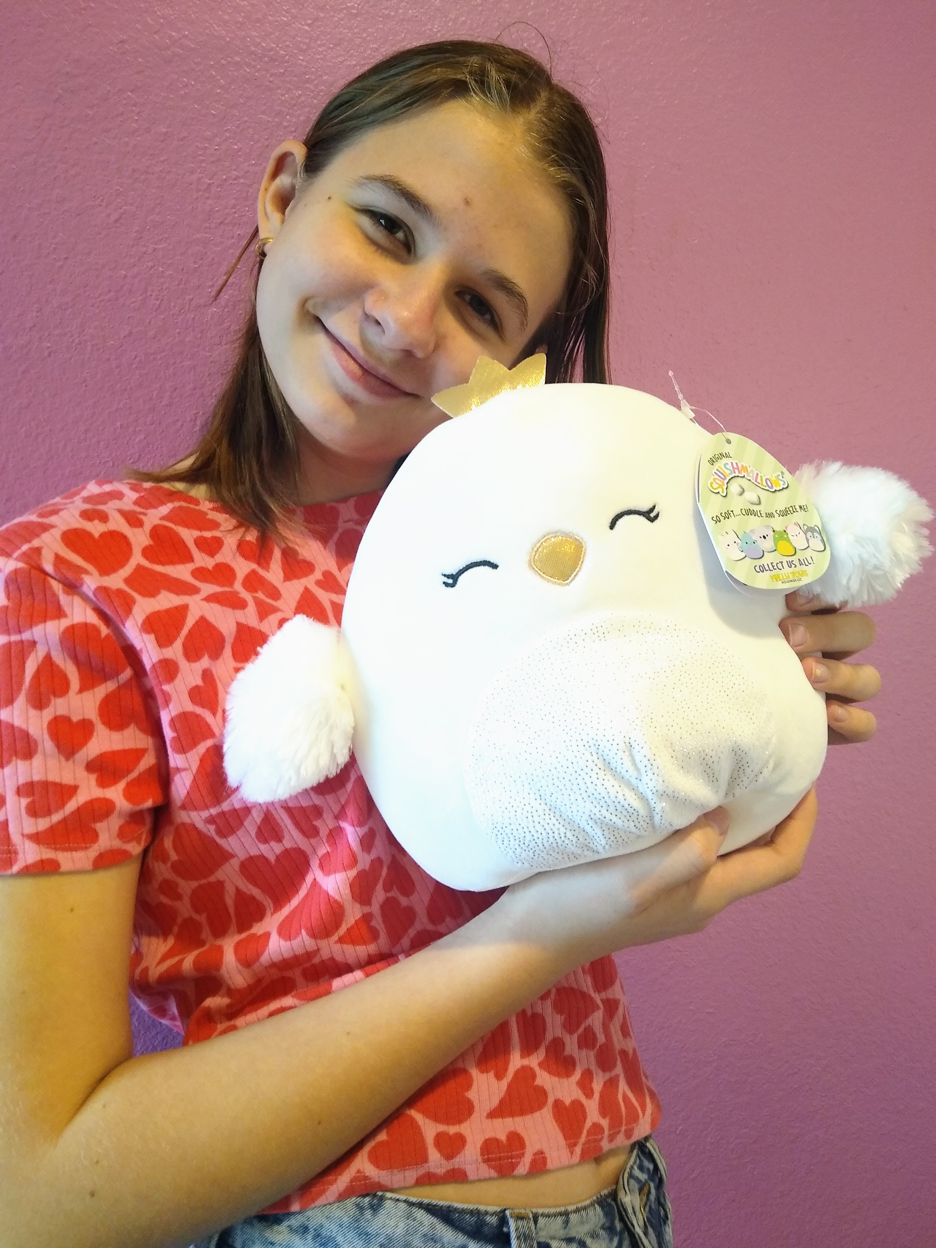 Squishmallow Alyssa 8-inch White Swan with fluffy wings and shimmery white belly.