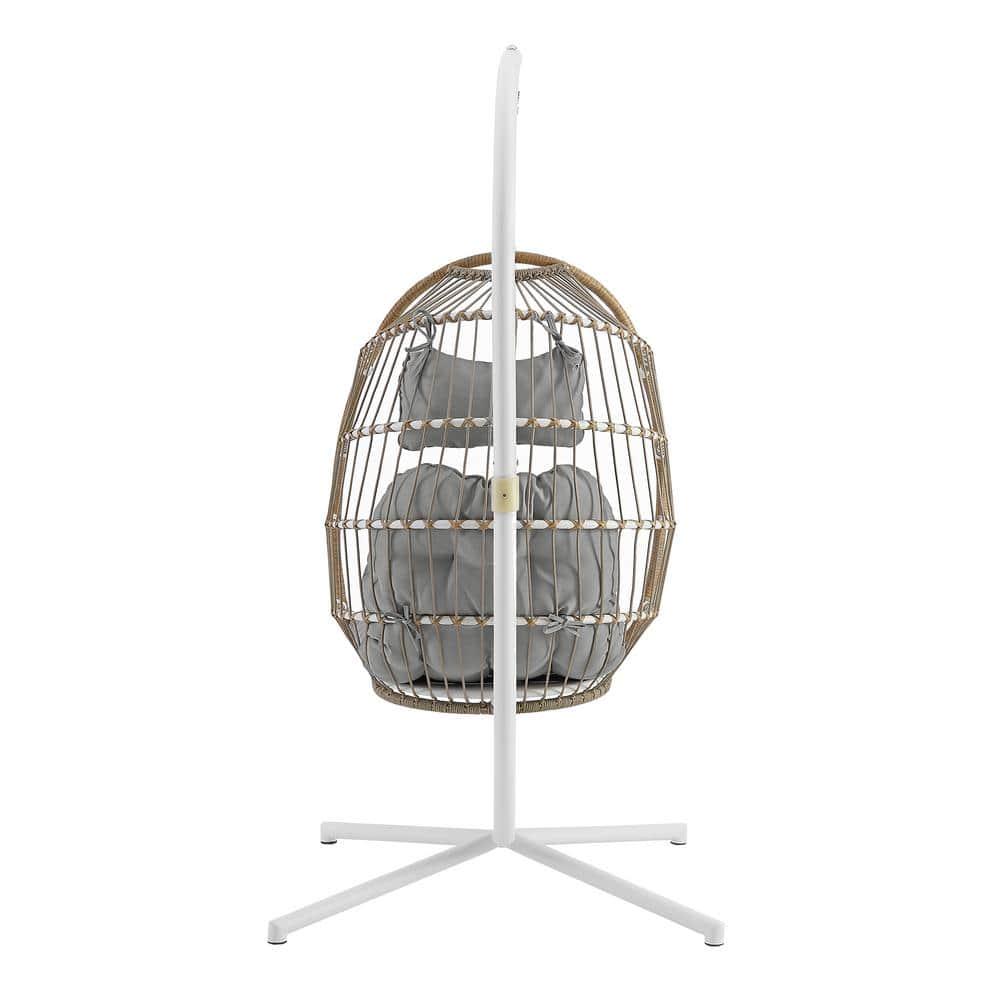 Welwick Designs 1Person Brown Rattan Patio Swing Egg Chair with White Stand and Gray Cushions