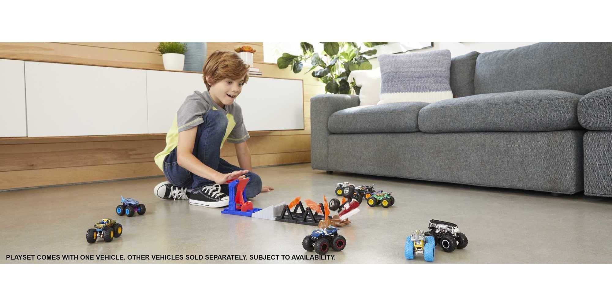 Hot Wheels Monster Trucks Fire Through Playset with 1:64 Scale 5-Alarm Toy Truck and Launcher