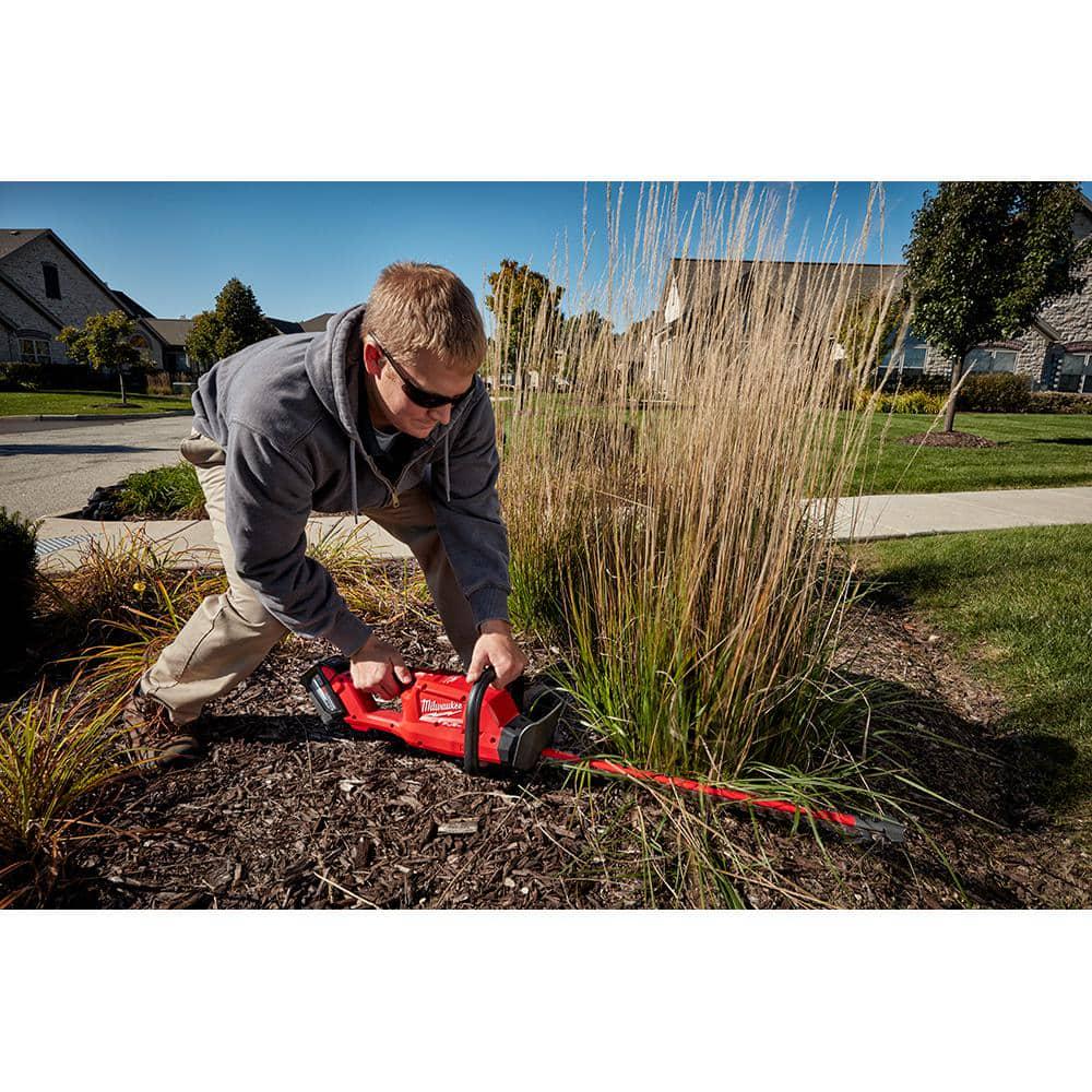 Milwaukee M12 FUEL 8 in 12V LithiumIon Brushless Cordless Hedge Trimmer Kit with M18 FUEL 24 in Hedge Trimmer