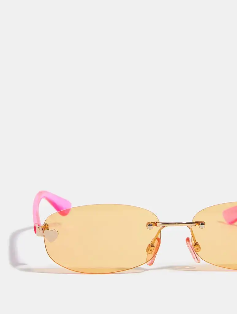Pink Rimless Narrow Sunglasses With Orange Tinted Lens