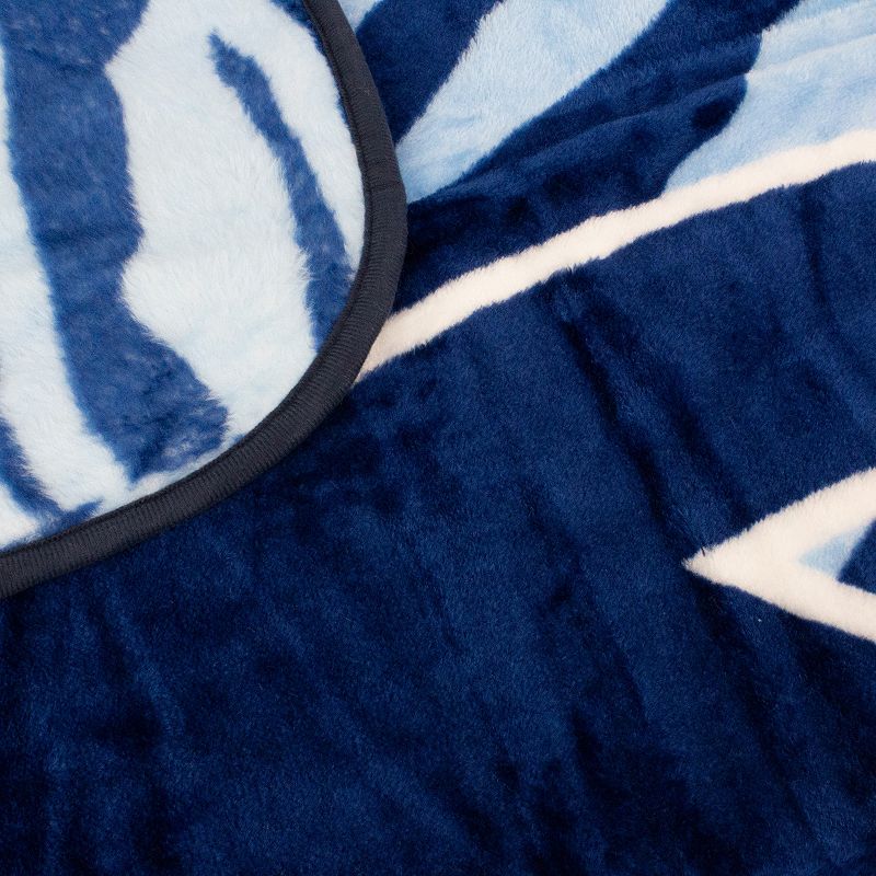 NCAA North Carolina Tar Heels Soft Raschel Throw Blanket