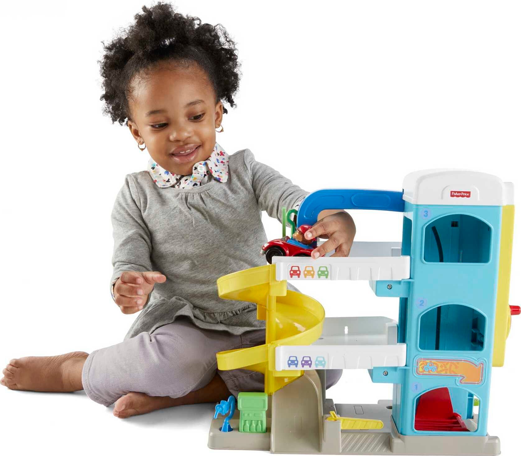 Fisher-Price Little People Helpful Neighbor’s Garage Toddler Playset with 2 Wheelies Cars