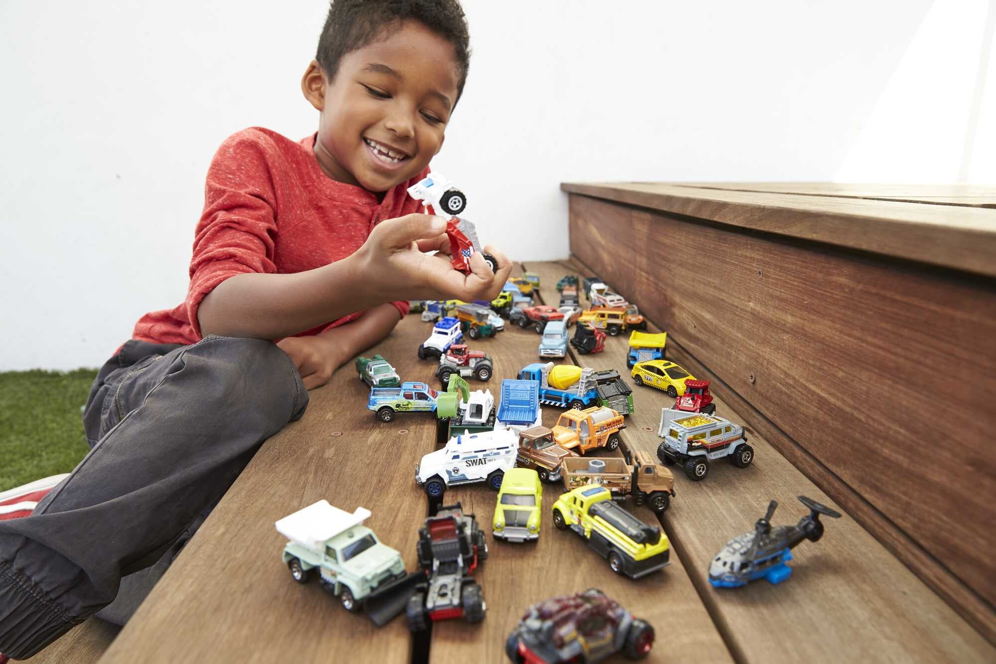 Matchbox Set of 50 Die-Cast Toy Cars or Trucks in 1:64 Scale (Styles May Vary)