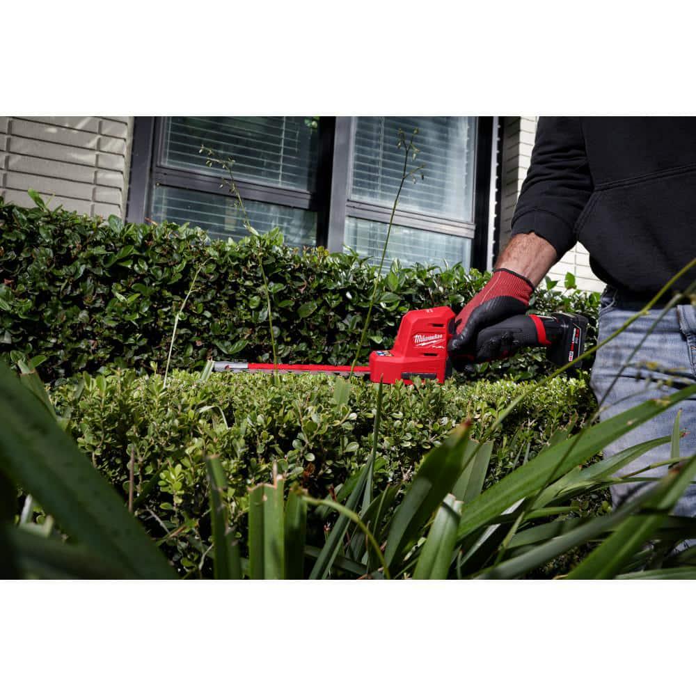 Milwaukee M12 FUEL 8 in 12V LithiumIon Brushless Cordless Hedge Trimmer Kit with M18 FUEL 24 in Hedge Trimmer