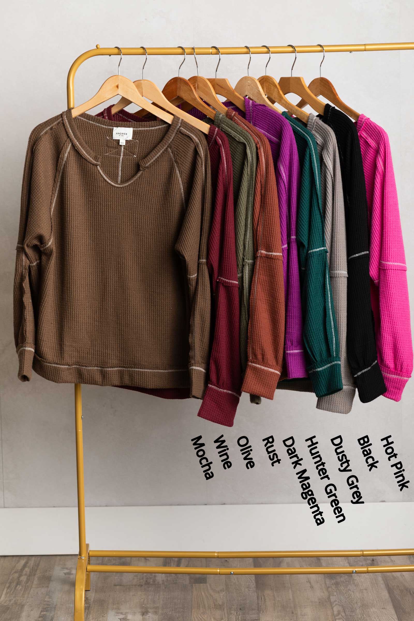 Notched Neck With Exposed Seams Knit Top