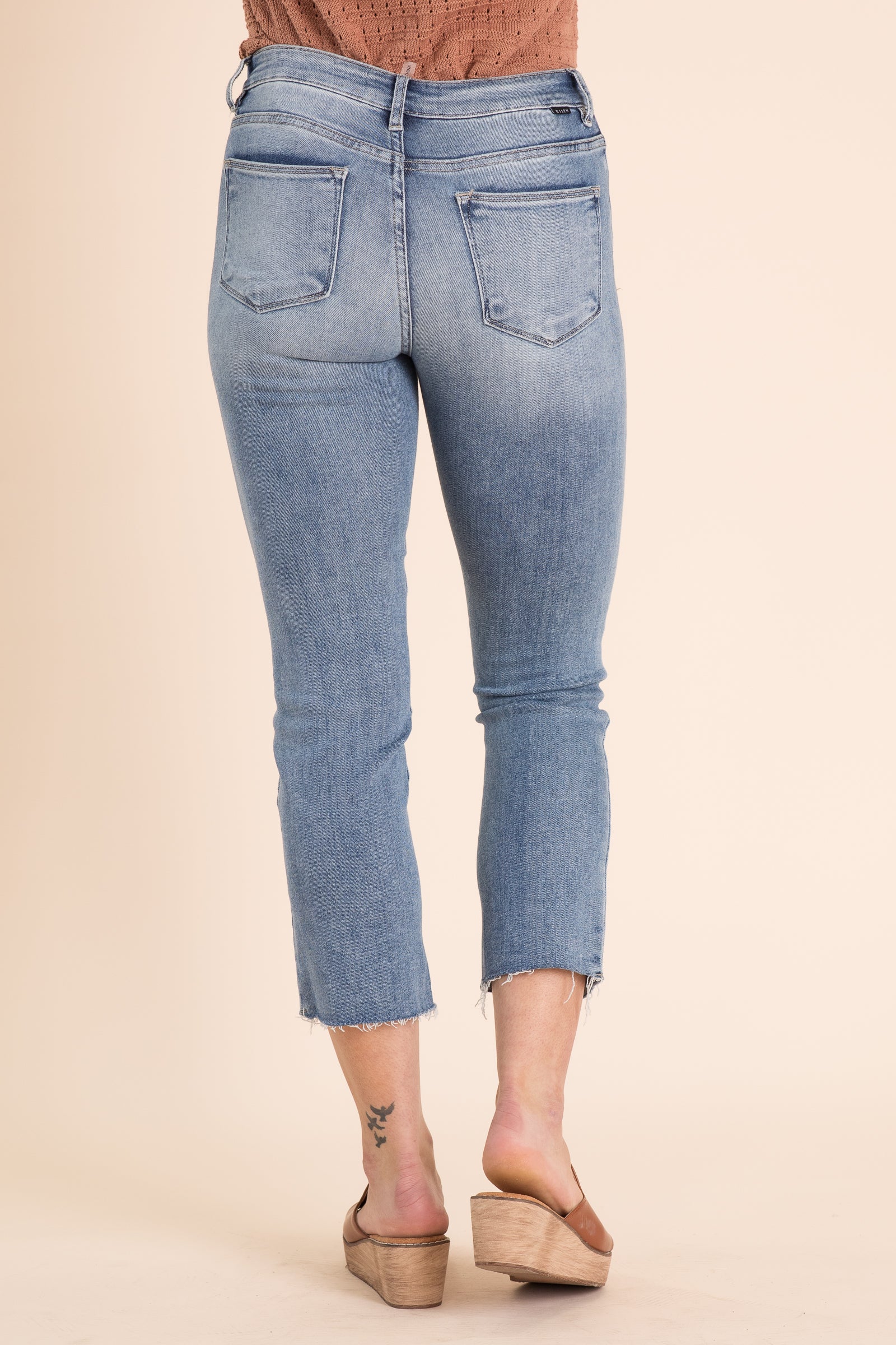 Risen Mid Rise Raw Hem Straight Leg Jeans