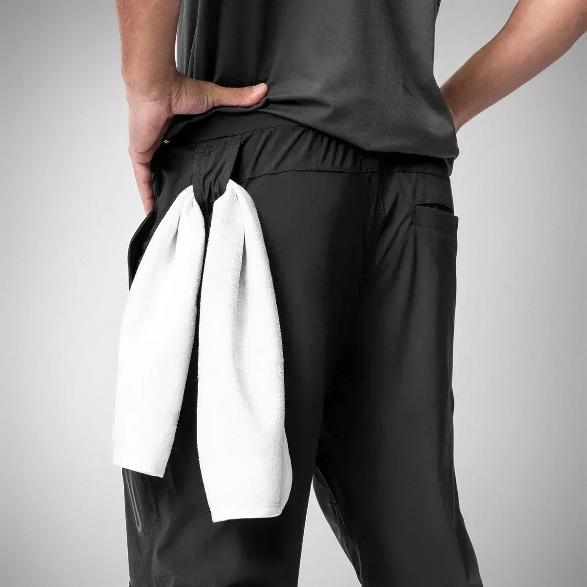 Calça Jogger Performance Titan™ com Suporte Inteligente para Toalha / Liberdade, Estilo e Funcionalidade em Uma Só Peça!