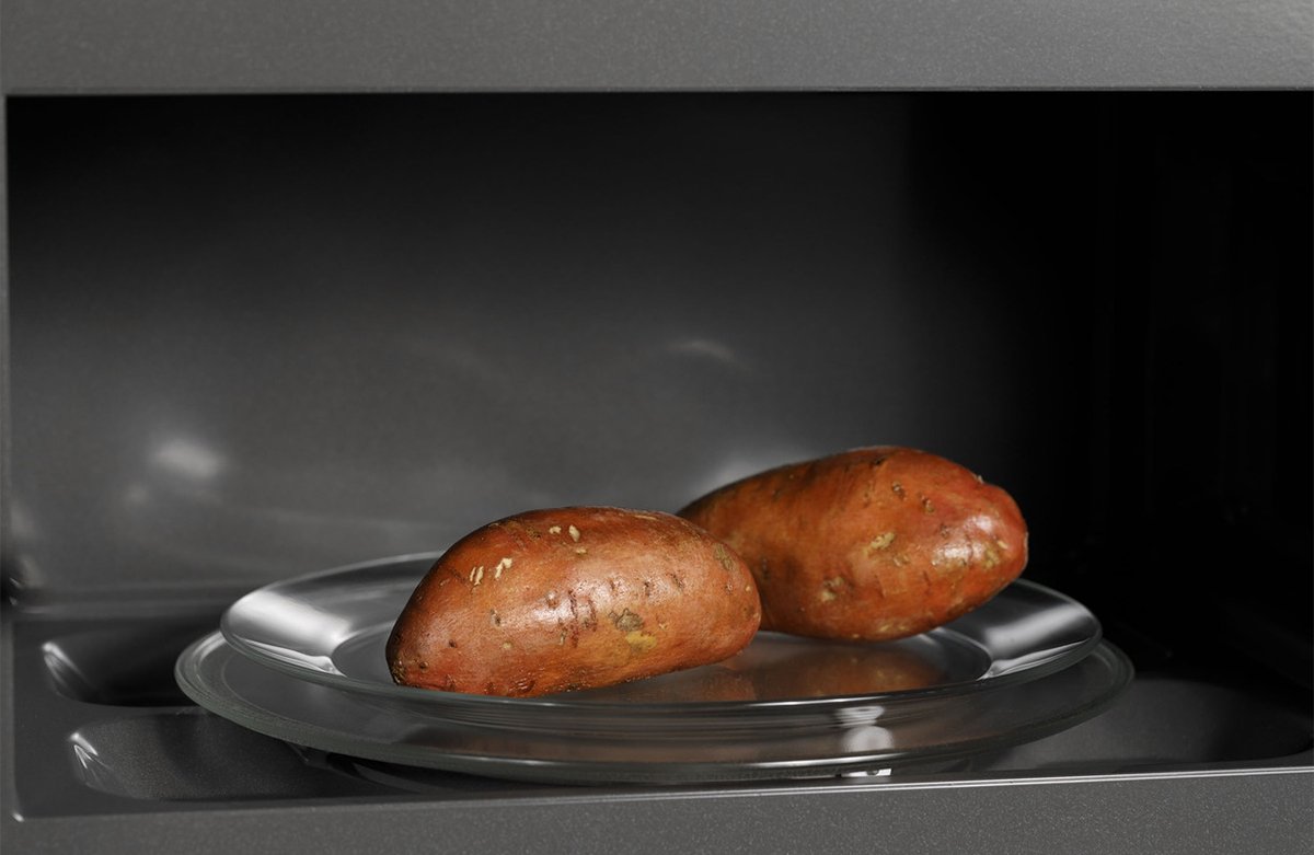 Cafe 1.9 Cu. Ft. Stainless Steel With Brushed Stainless Over-The-Range Microwave Oven