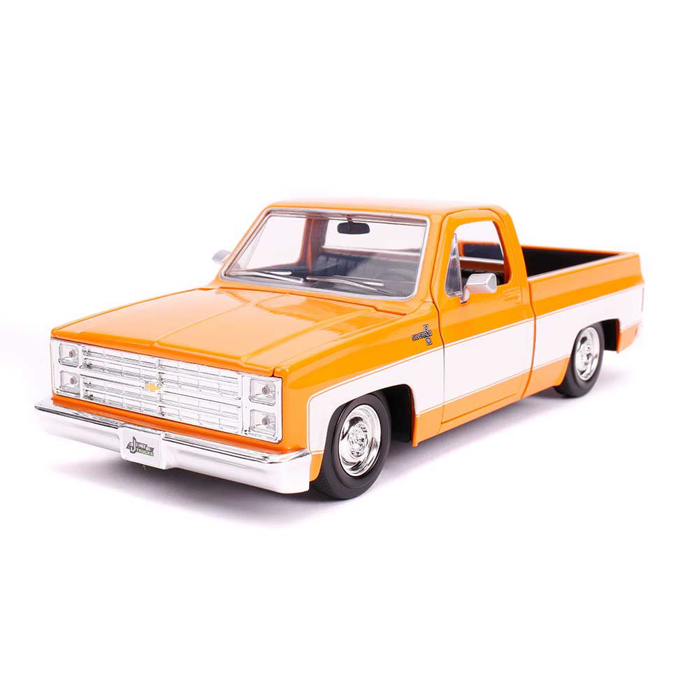 Jada 31607-MJ 1985 Chevrolet Silverado C-10 Pickup Truck Custom Wheels Orange and White Just Trucks 1 by 24 Diecast Model Car