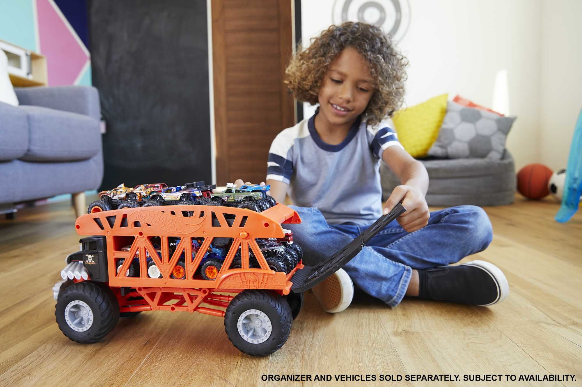 Hot Wheels Monster Trucks Monster Mover， Large-Scale Launcher and Hauler， Stores 12 Toy Trucks