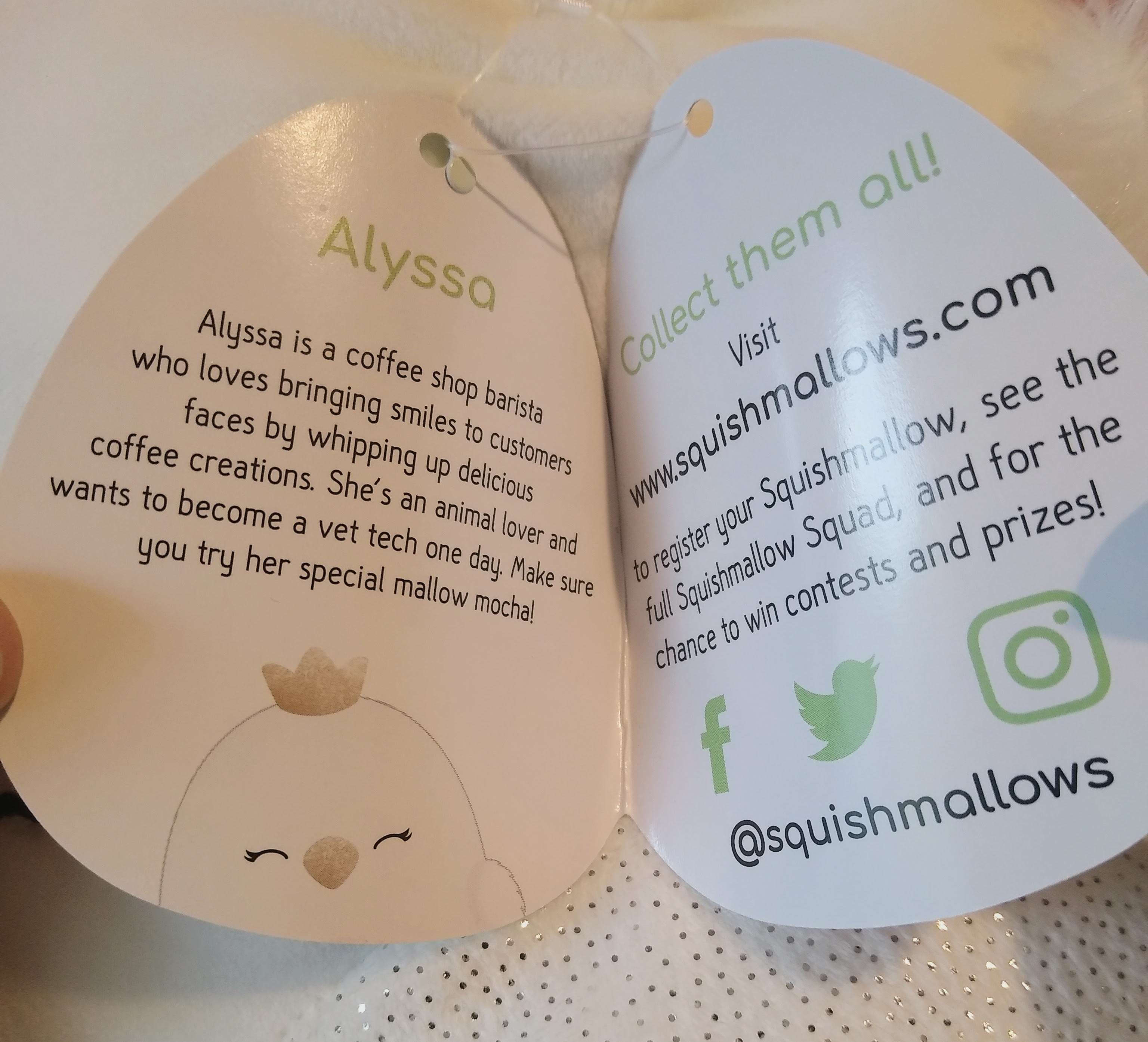 Squishmallow Alyssa 8-inch White Swan with fluffy wings and shimmery white belly.