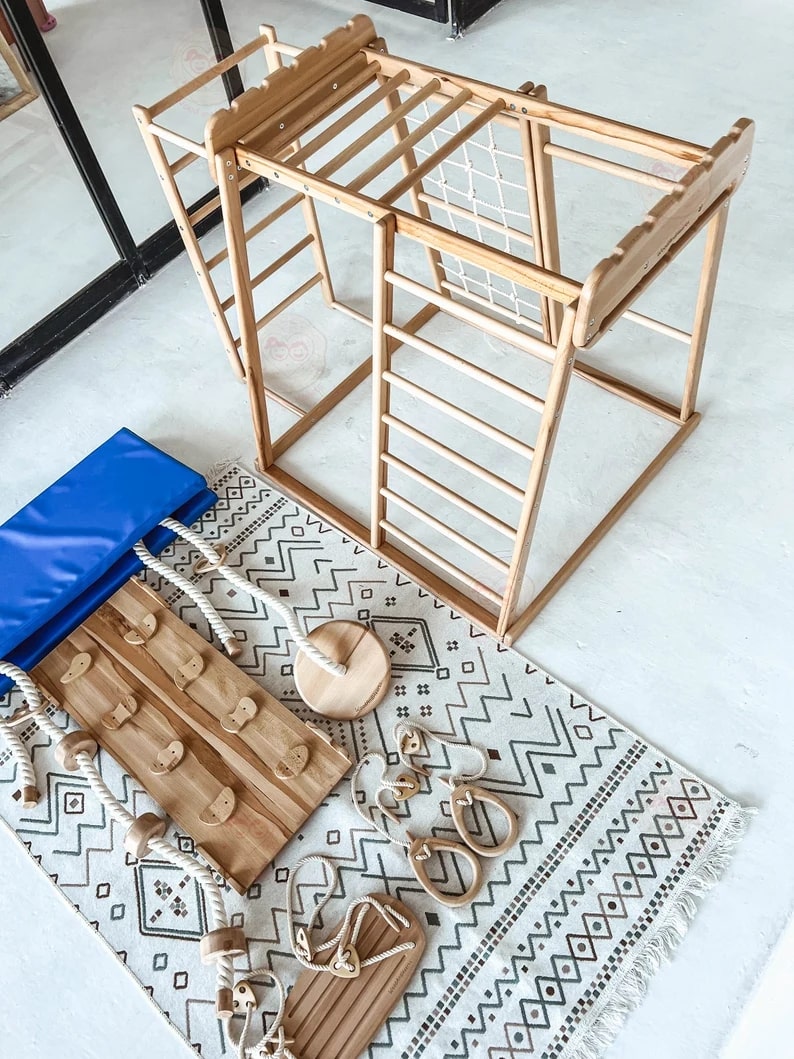 Woodandhearts Scandinavian Play Complex: Swedish Stepladder， Rocking Ramp， Climbing Rope， Monkey Bars， Gymnastic rings， Kid Swing， Play Mat， Jungle Gym， Wooden Natural color， for Kids 1-4 years