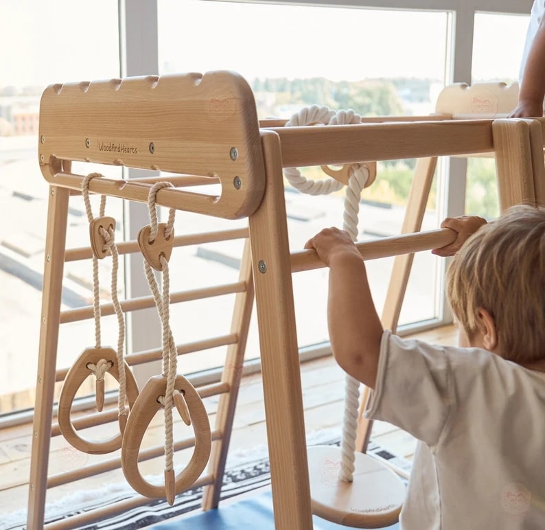 Woodandhearts Scandinavian Play Complex: Swedish Stepladder， Rocking Ramp， Climbing Rope， Monkey Bars， Gymnastic rings， Kid Swing， Play Mat， Jungle Gym， Wooden Natural color， for Kids 1-4 years