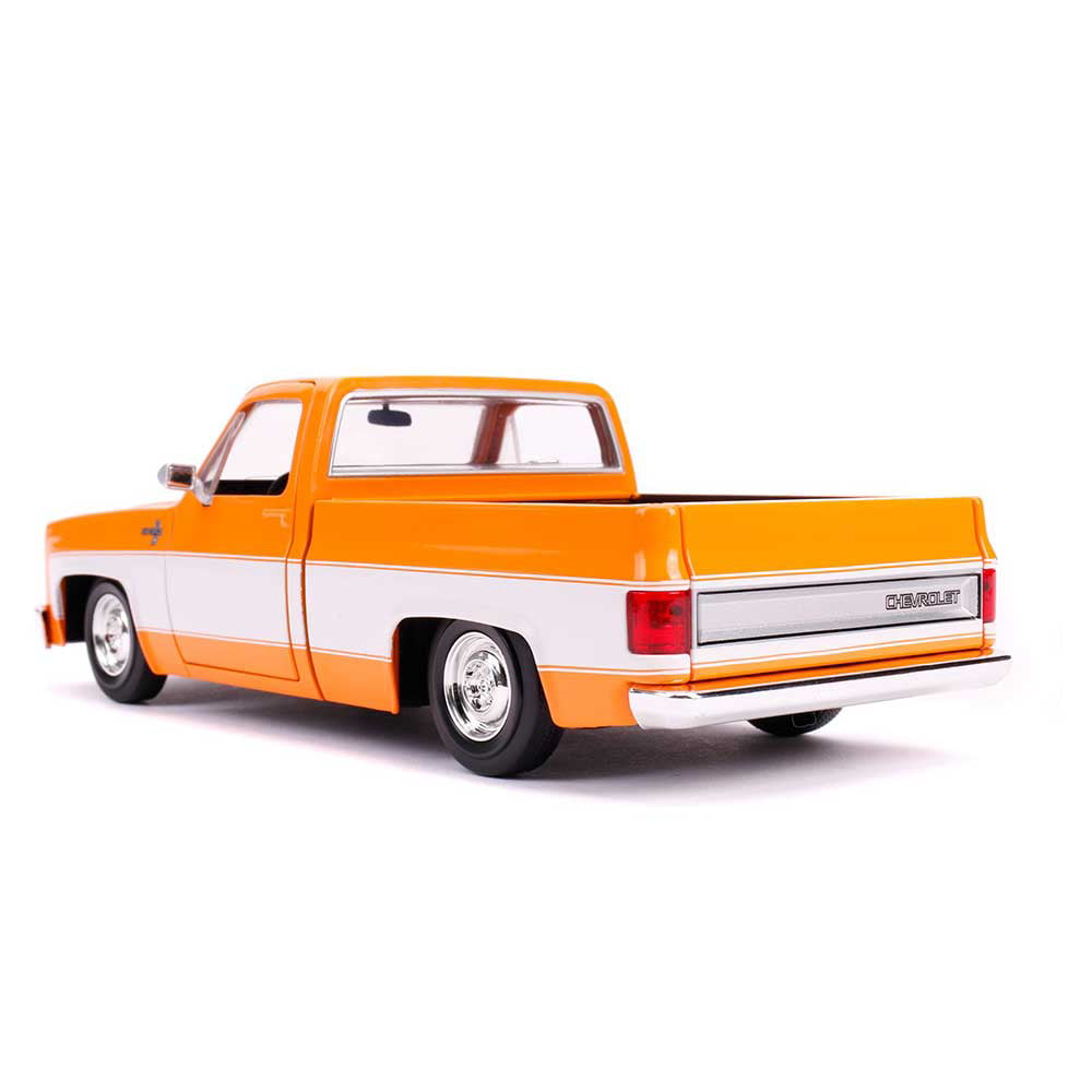 Jada 31607-MJ 1985 Chevrolet Silverado C-10 Pickup Truck Custom Wheels Orange and White Just Trucks 1 by 24 Diecast Model Car